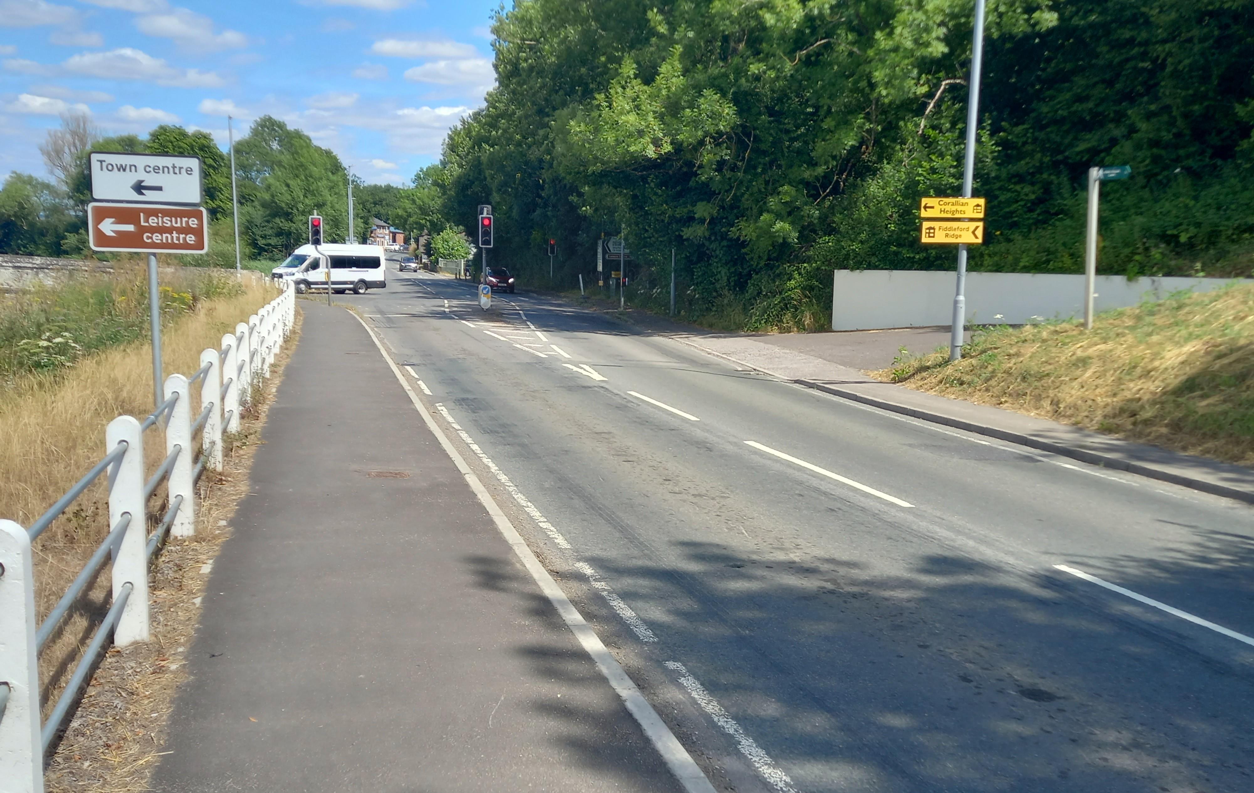 Approaching red traffic lights on the approach to Sturminster Bridge