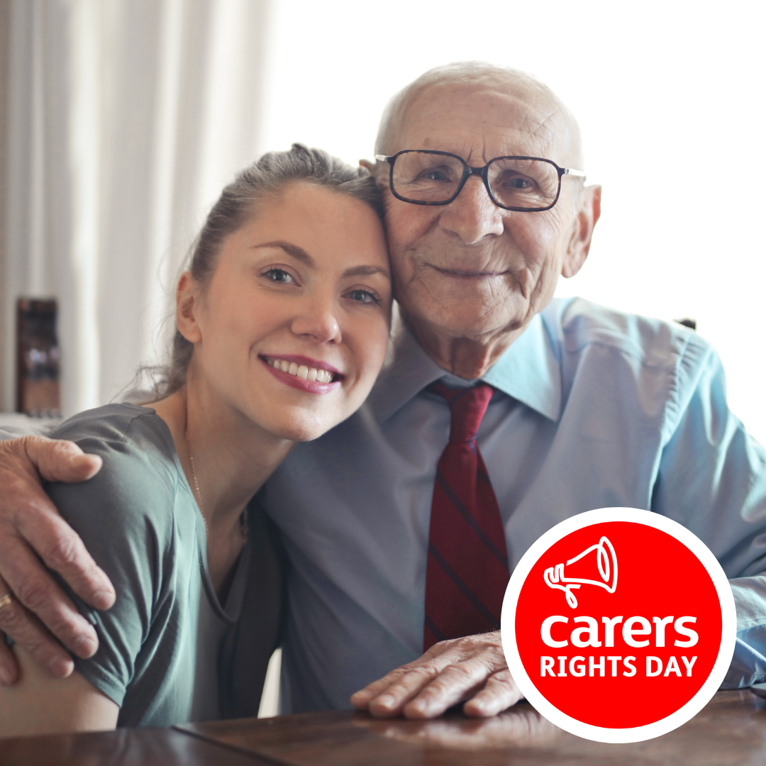 This is image shows two people of different ages, connected through care as they are sitting close to one another in a caring pose.