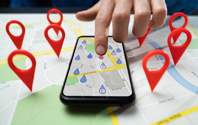 A phone looking at locations on a map